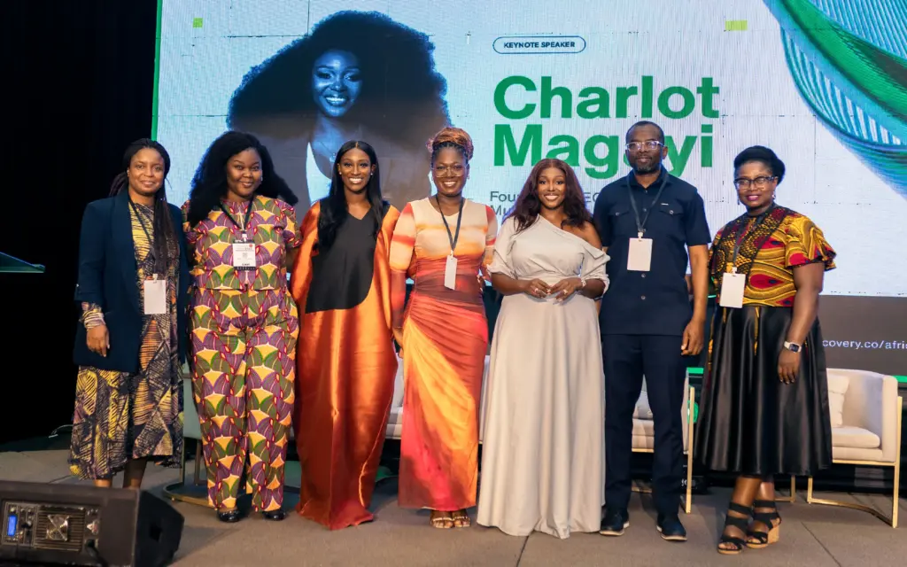 Mandy Nyarko on stage with fellow speakers